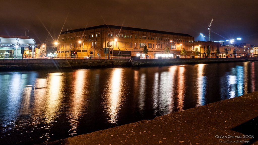 Merchants Quay Shopping Centre over River Lee in the night